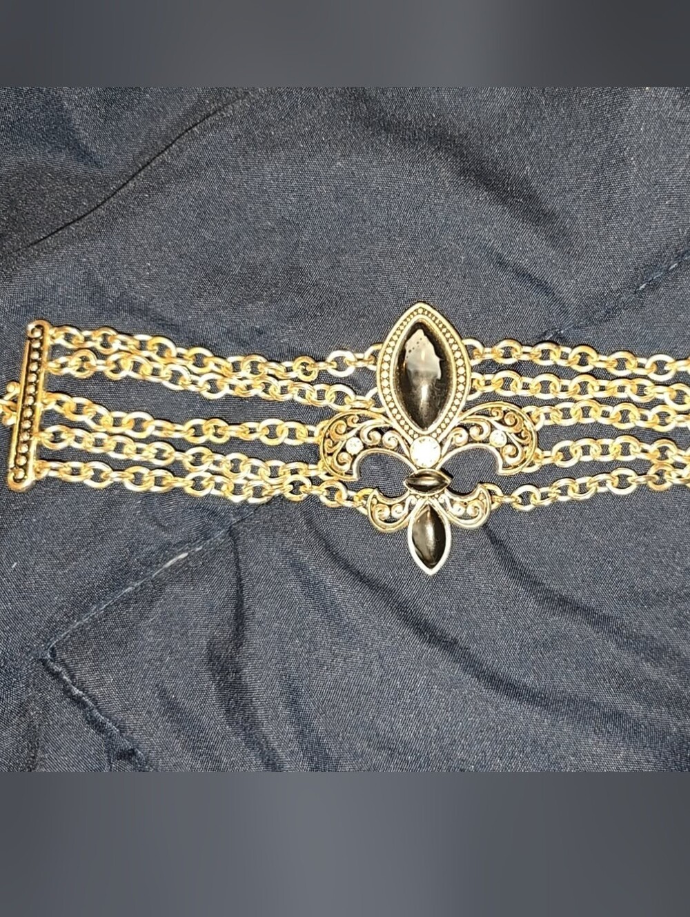 Gold Fleur-de-Lis Multi-Chain Bracelet with Black Stones